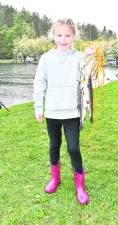 <b>Mackenzie Mielczarek of Sparta shows off her catch.</b>