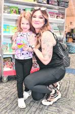 Francesca and Melissa LoPorto pose for a photo.