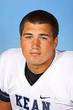 New football coach Austin Caldwell during his days playing for the Wildcats