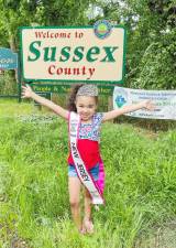 Madison Wertz shows off her crown and sash.