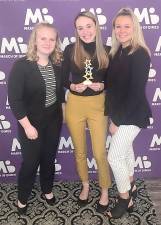 Wallkill Valley FBLA Community Service Vice President Madison Gunderman, President Riley Cunniffe, and Community Service Vice President Danielle Fetzner accept the Northern New Jersey March of Dimes Hero Award for raising $14,517 for healthier babies. (Photo provided)
