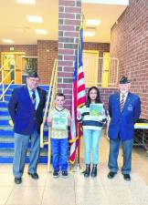 John Kopcso, left, and Robert Caggiano of the American Legion pose with Hardyston Middle School students Anthony Petronella and Clarisse Simbulan. (Photos provided)