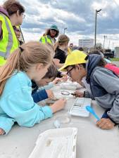 Students learn about recycling, solid waste disposal/landfill construction, wastewater management, watershed restoration, aquatic insects and microplastics.