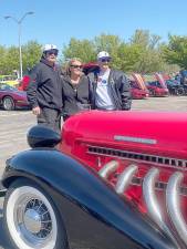 From left: Vin DePeppo (Rodfather Gang Car Club adviser), Dr. Mary Jean Negri (owner of Friendly’s of Newton and Wantage which sponsor the event) and Jack Calvert (president of Rodfather Gang) with DePeppo’s Auburn Speedster at Saturday’s 2021 debut cruise (Photo by Laurie Gordon)
