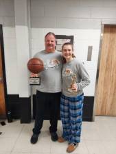 Wallkill Valley girls basketball coach Earl Hornyak holds the tournament trophy, and Jackie Schels has one for being the tournament’s Most Valuable Player. (Photos provided)