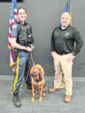 Detective Catherine Young and K9 Nutmeg pose with Sheriff Michael Strada. (Photo provided)