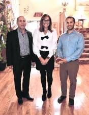 Anthony Berardi, County Commissioner Jill Space and Alex Berardi posing for me. Berardi Building Co., LLC, won the Redevelopment Award.