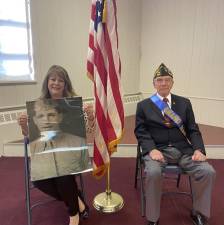 Bonnie Matthews of the Daughters of the American Revolution holds a picture of Jacob Yanoff, who served during World War II. Yanoff and Joe Monaco, right, will be grand marshals of the Newton Memorial Day parade Monday, May 29. (Photos by Deirdre Mastandrea)