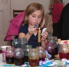 Zoe Sweetman, 9, creates her own Pysanky Easter Egg. Her grandmother, Daria Bonomini of Highland Lakes, teaches a class on how to decorate eggs in this style. Sweetman has been decorating the eggs since she was 6 years old.