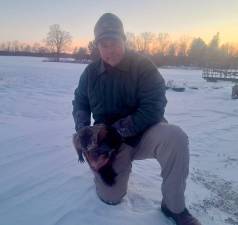 <b>Parker Space is shown with the Sussex County groundhog, Stonewall Jackson.</b>