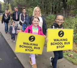 Students participate in Walking School Bus event.