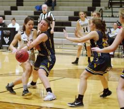 While moving forward Wallkill Valley's Francesca Ciasullo loses possession of the ball when it is batted away by Vernon's Alicja Wesloske in the second quarter. Ciasullo scored 6 points, grabbed 5 rebounds and made 3 assists.