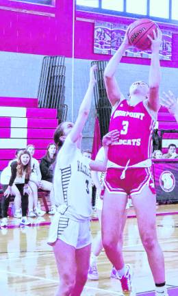 <b>High Point's Claire Sieminski grabs the ball during a rebound. Sieminski grabbed 11 rebounds.</b>