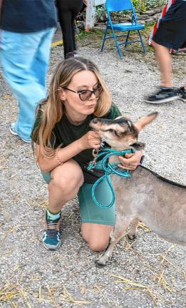 <b>Sofia Jantosch with her goat Spicy Dorito on Saturday, Aug. 2. (Photo by Nancy Madacsi)</b>