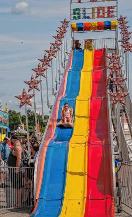 <b>Adalyn Shenige comes down the slide Saturday, Aug. 2. (Photo by Nancy Madacsi)</b>