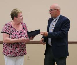 PHOTO BY MARK LICHTENWALNER Jane Damstra receives a special proclamation recognizing her work with the Vernon Senior Center.