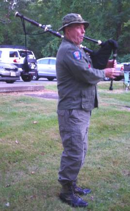 Bagpiper Mark Noyes of Stanhope performed several pieces during the ceremonies.