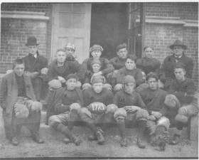 The Franklin Vo-Tech football team in 1921, as they trained to work in the mine and mill. Players shown (many with grandchildren remaining in our county): Principal Roselle, Garris, Leo Osborne, Harry Stormes, Alva Davies, Coach Art “Linkey” Donlley, Roby Mindlin, George Kasisky, Silvio “Lightning” Lusardi, Pete Ora, Bob Romoynes, “Pat” Joe Morris, Ted Estelle, Andrew Revey, and Max Mindlin.