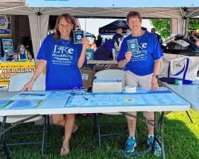 Volunteers hand out resources at the Lake Hopatcong Block Party. (Photo provided)
