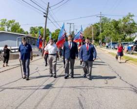 Marchers in the 2023 Memorial Day Parade in Newton. (File photo by Sammie Finch)