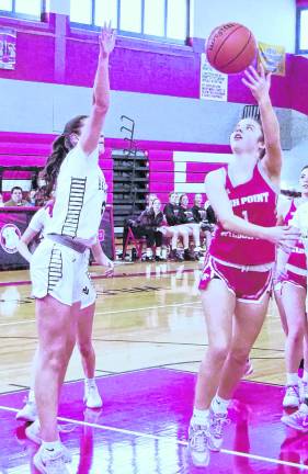 <b>High Point's Addison Yanoff tosses the ball towards the hoop during a shot. Yanoff scored nine points.</b>