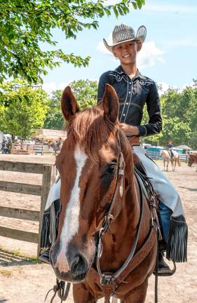 <b>Skyler Vellenga on McDoo at the fair Saturday, Aug. 2. (Photo by Nancy Madacsi)</b>