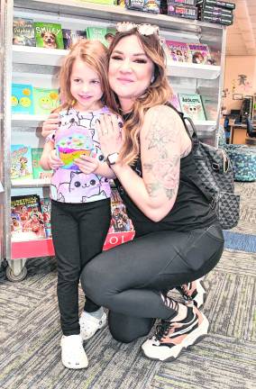 Francesca and Melissa LoPorto pose for a photo.