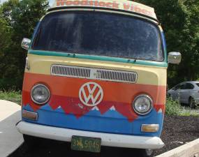 The van sports Wyoming license plates and reminds us of the Woodstock Festival held this weekend 50 years ago in upstate New York