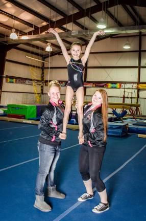 Coach Paedyn Babcock and Coach Taylor Spina with Sabrina Dispenziere of Sandyston.