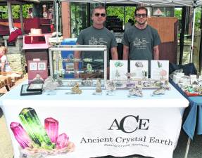 Anthomy Tomaselli of Ancient Crystal Earth and Deavid Lerman of David's Minerals pose for a photo.