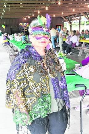 Herminia Irizary of Franklin wears a mask.