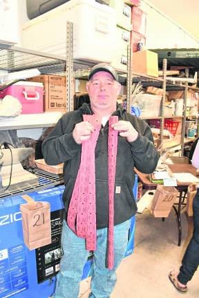 Tom Talmadge of Pennsylvania holds raffle tickets.