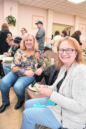 Susan Long of Sparta and Mary Gange of Sparta wait for the rafle to be called.