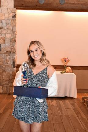 WO5 Bridget Dudziec of Katie’s House receives the Bright Future Award.