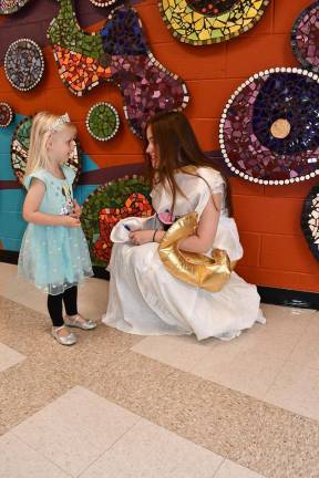 Arya Systma of Sussex Borough poses with Miss Potts from Beauty and the Beast.