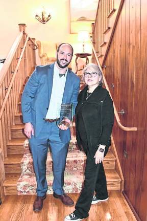 Jason Fuchs and Kerri Marino are shown. Krogh’s Restaurant and Bar won the Business Expansion Award.