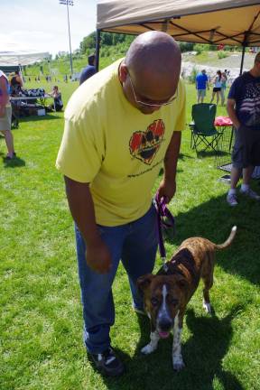 Ben Ortiz of Vernon-based HEALS Rescue brought an assortment of dogs and some kittens available for adoption.