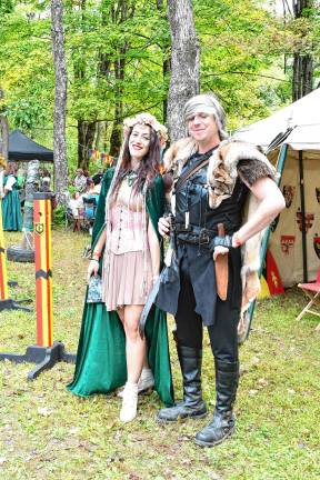 Angela and Daniel Flannery of Barto , Pa., are dressed as a fairy and a killer.