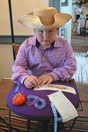 <b>Heath Ziccardi, 10, makes numbers of bobbin lace.</b>
