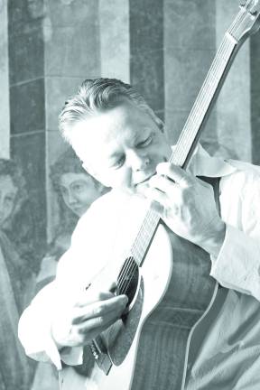 Australian guitar virtuoso Tommy Emmanuel.