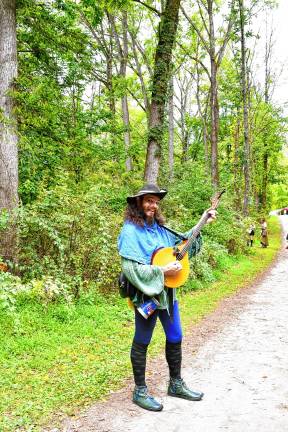 The foxy Bard is among the musicians at the festival.