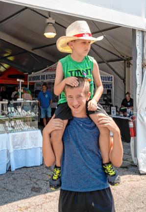 <b>John and Cameron Rakowski on Saturday, Aug. 2. (Photo by Nancy Madacsi)</b>