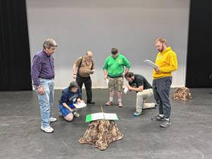 <b>The cast of ‘Mile 59’ in rehearsal. From left are Phil Cocilovo, Fenrir Lewin, Stephen Burke, Benjamin Smith, Leo Watson and Gavin Bermingham. (Photo provided)</b>
