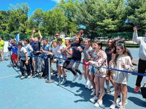 <b>Students cheer on their solar-powered cars in the Junior Solar Sprints on May 20 at Hershfield Park in Pompton Lakes. (Photo courtesy of Avenues in Motion)</b>