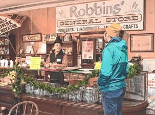 <b>A general store is recreated for the Back in Time Yuletide Stroll last December in Stillwater. (File photo by Maria Kovic)</b>