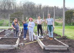 Girl Scout Cadettes from Troop 96266 - Brooke Jensen, Gabby Rubalcava, Sabrina Barbato, Nicole Wasniowska, and Catherine Byra - help revitalize Hardyston’s community garden.