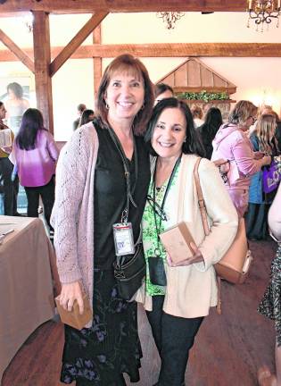 <b>Sue Sisco and Jane Gamutan, both of the Sussex-Wantage Regional School District, pose for a photo.</b>