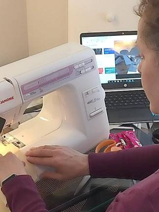 Kittatinny Regional High School teacher Danielle Tooker virtual-teaches how to sew masks.