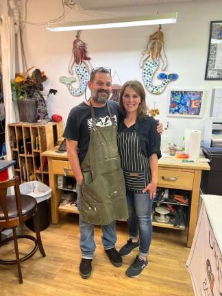 Holly Gouger and Christopher Michalek at their stained-glass studio and glass shop located on 124 Main Street in Franklin.