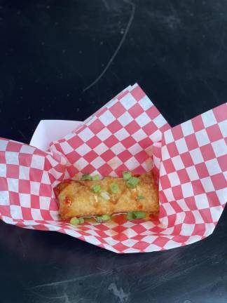 <b>Crab rangoon egg roll from Heart’s Catering</b>